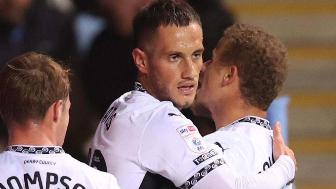 Jerry Yates celebrates with Derby County teammates after scoring against Coventry City