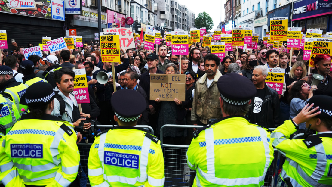 Thousands of counter-protesters to a proposed far-right demonstration gathered in Walthamstow on a street outside an immigration centre which had been earmarked as a potential flash point. The Metropolitan Police deployed extra officers to north-east London to maintain a presence in the area