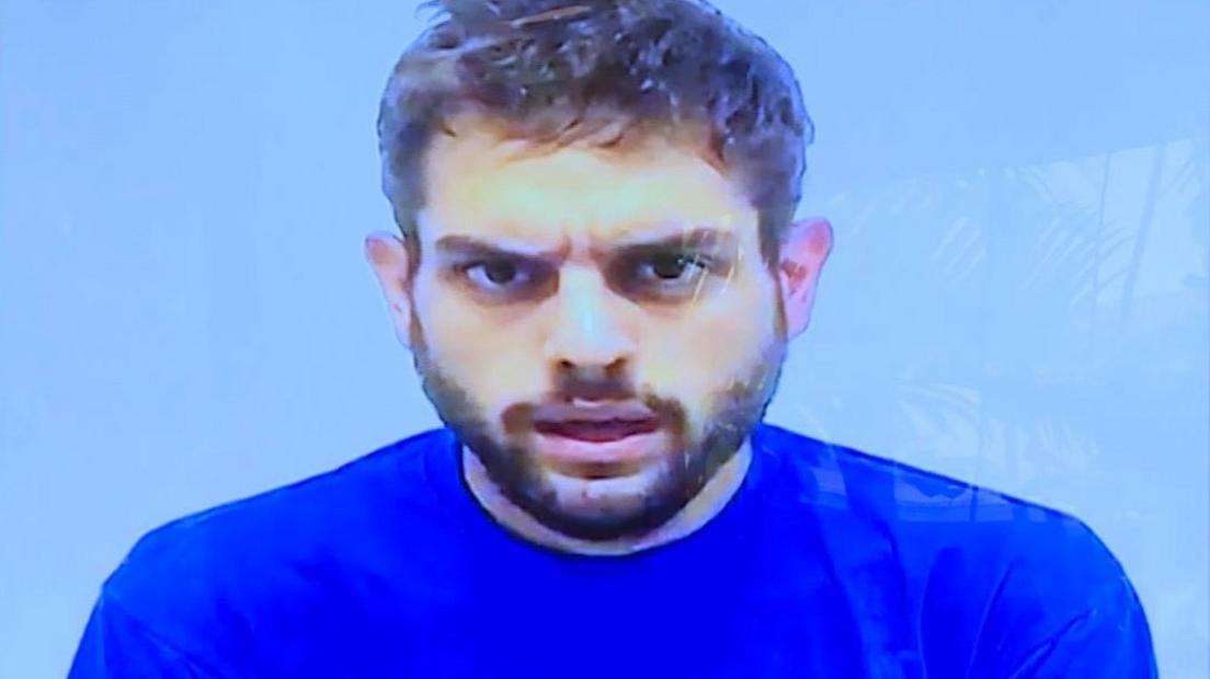 This TV grab shows opposition Venezuelan lawmaker, Juan Requesens in detention as he admits on a video broadcasted by the Venezuelan government on August 8, 2018 to have had contact with one of the suspects of the alleged plot against Venezuelan President Nicolas Maduro.