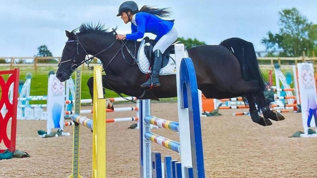 Crystal Pincott horse riding before she underwent open heart surgery