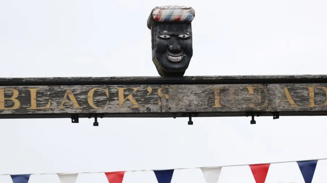The sculpture on a pub sign in Ashbourne