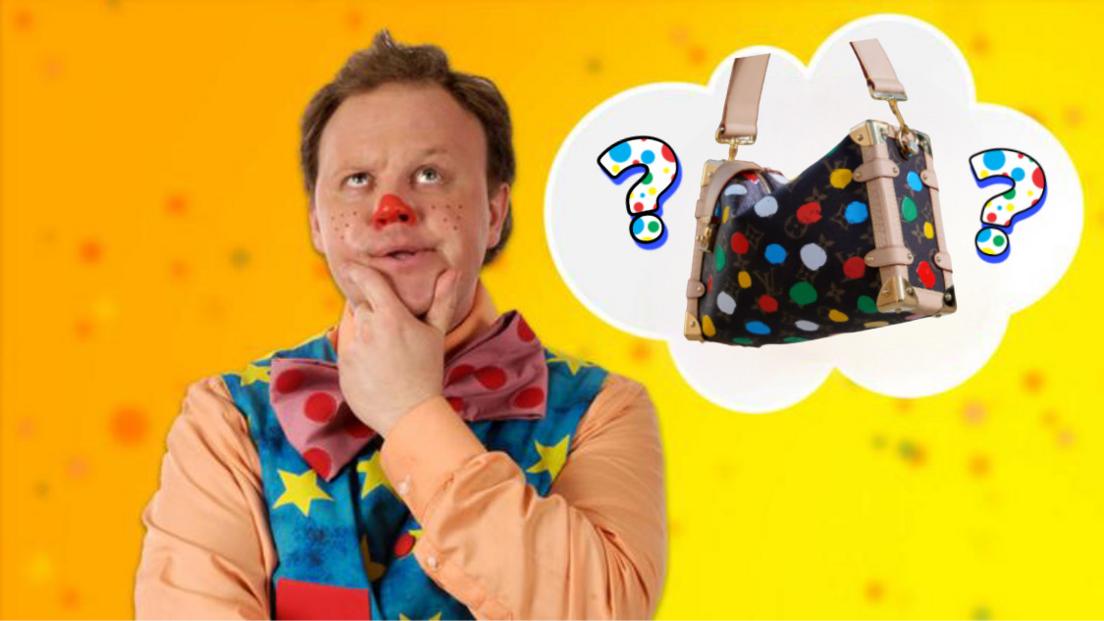 Mr Tumble thinking with a Loui Vuitton bag.