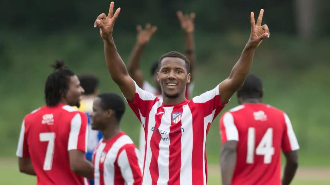 Richard Kone celebrates scoring a goal while playing for non-league side Athletic Newham