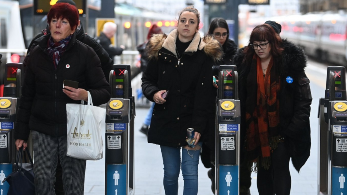 Passengers at King's Cross station in London