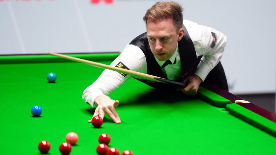 Judd Trump plays a shot at the Crucible