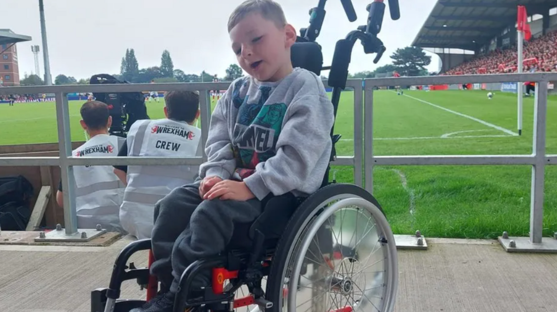 Louis in his wheelchair at Wrexham's Racecourse Stadium