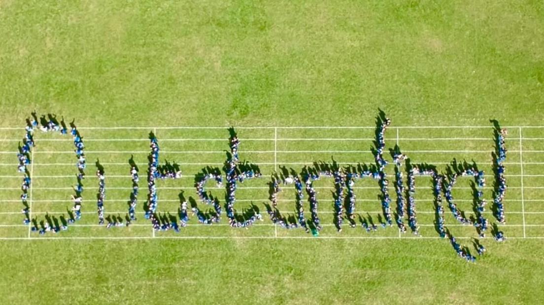 Children spell out outstanding 