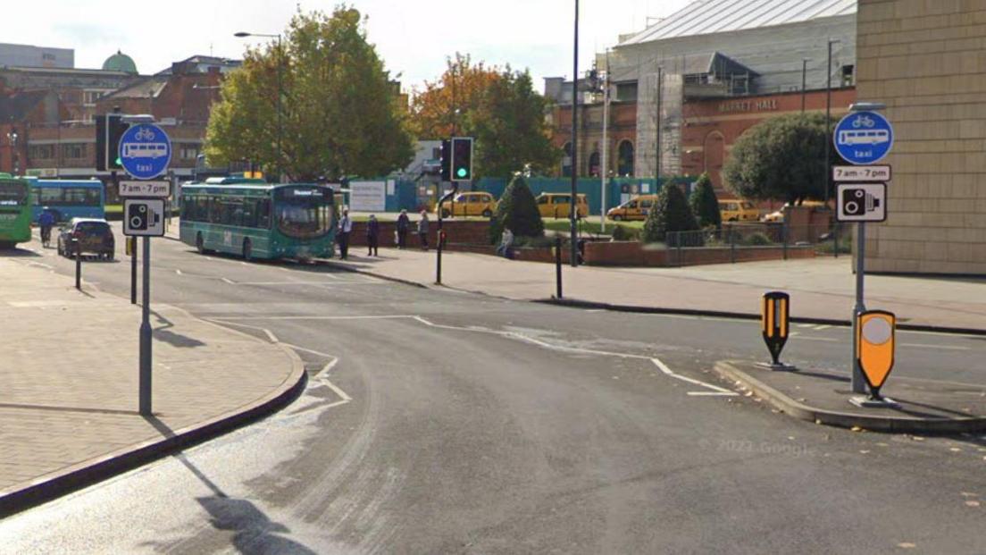 A general view of the bus lane in Corporation Street, Derby. There are two blue signs detailing the 7am-7pm restrictions for other motorists.