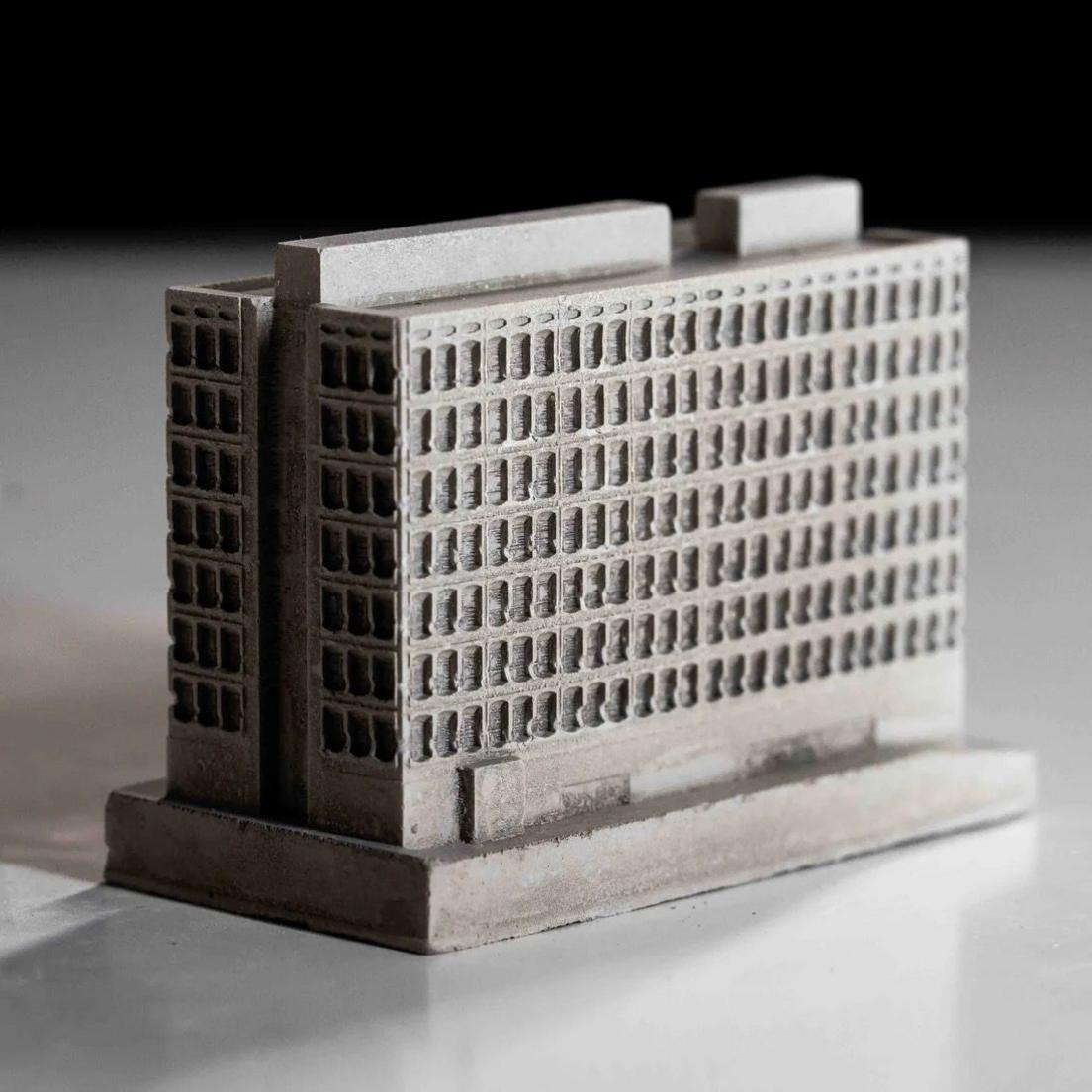 A model of Wolverhampton School of Art building which features rows of windows and concrete frames. 