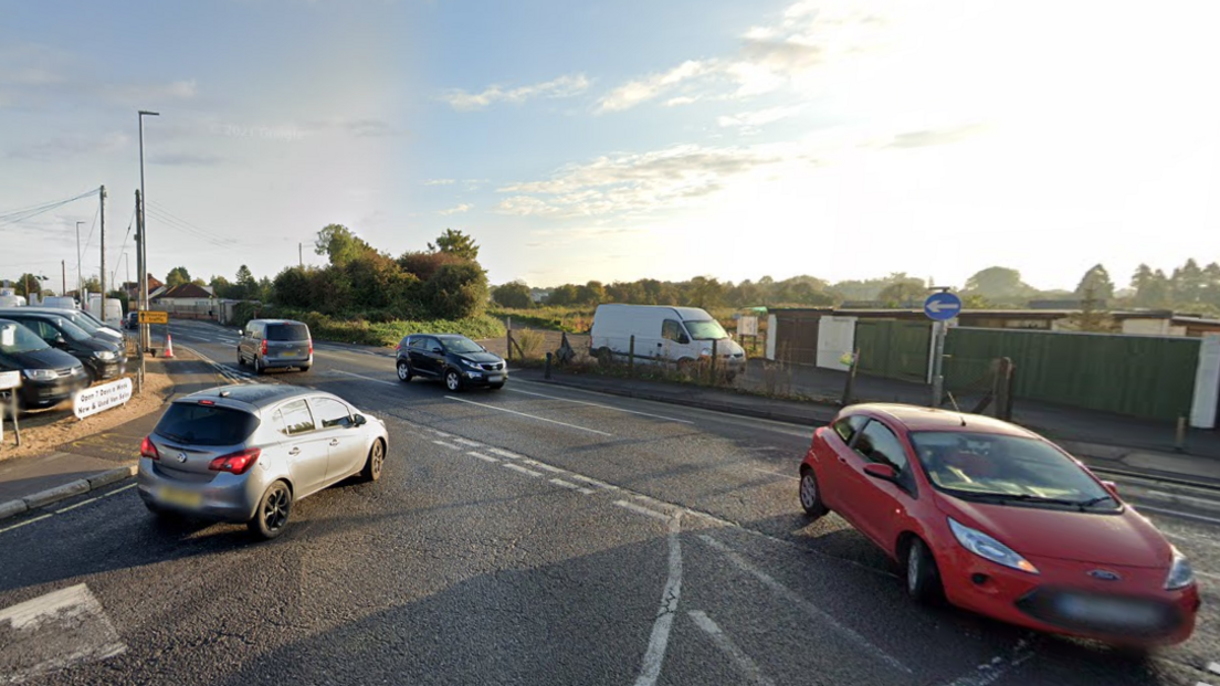 A view looking North on the A38 Bristol Road in Bridgwater with cars turning into a junction