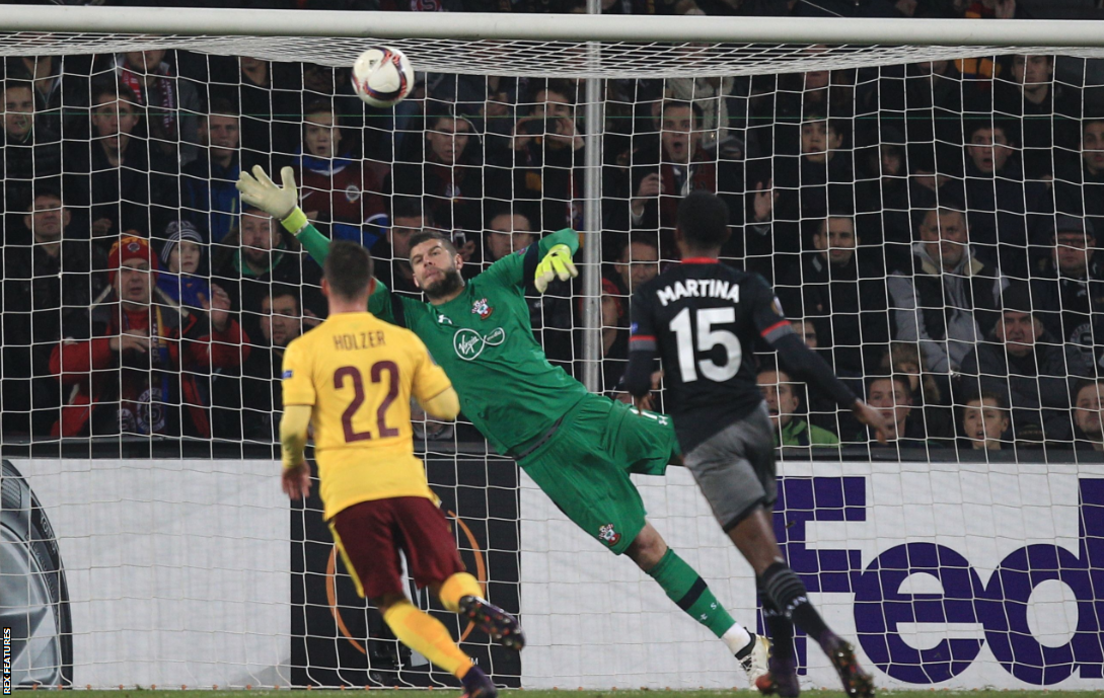 Southampton goalkeeper Fraser Forster makes a save during his side's Europa League game away to Sparta Prague