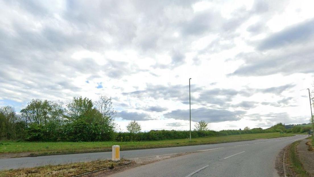 A generic image of the A53 pictured at a roundabout junction, where one of the exits, not seen on this photo, is signposted Hodnet.