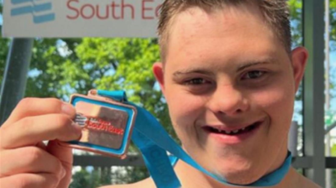 Jack Archer with swimming medal 