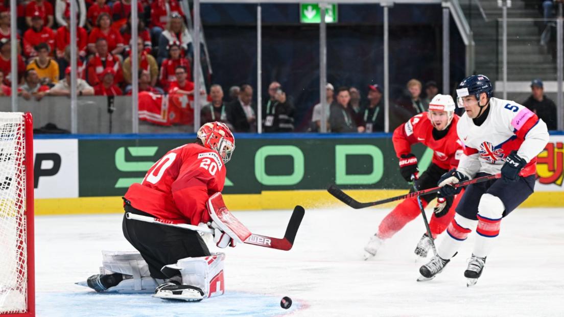 Great Britain attempt a shot against Switzerland