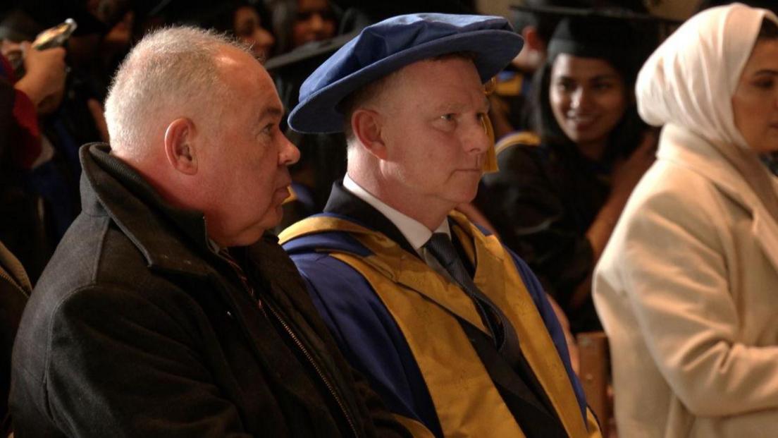 Mark Robins and former Sky Blues chief executive Dave Boddy at Thursday's degree ceremony at Coventry University