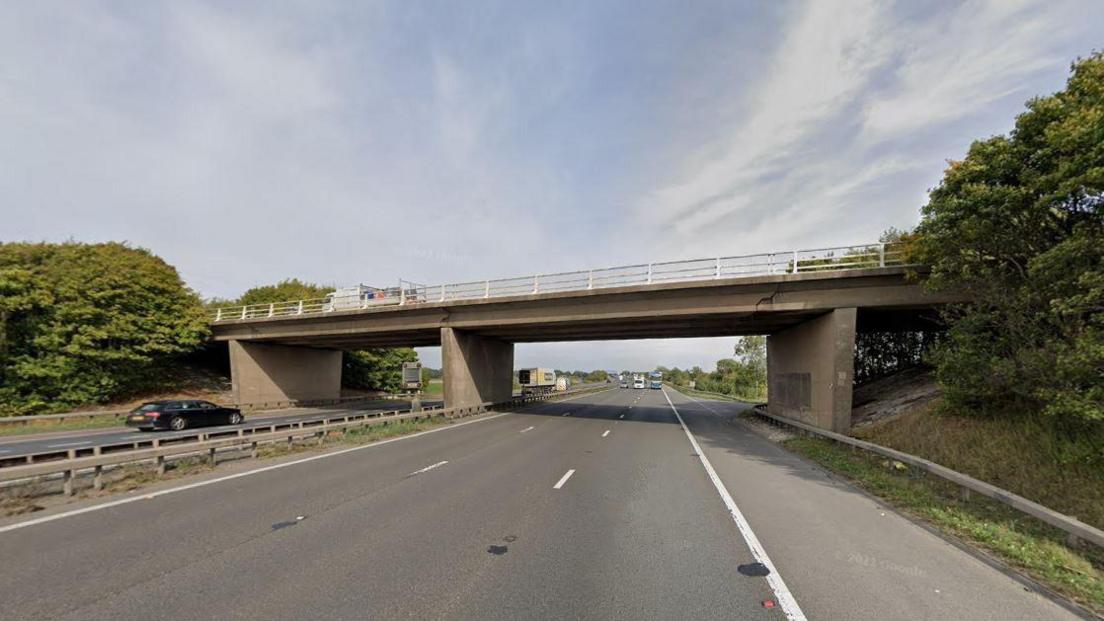 A Google photo of the M18 with Greenlands Lane bridge going over the top. There are not many cars seen on the road.