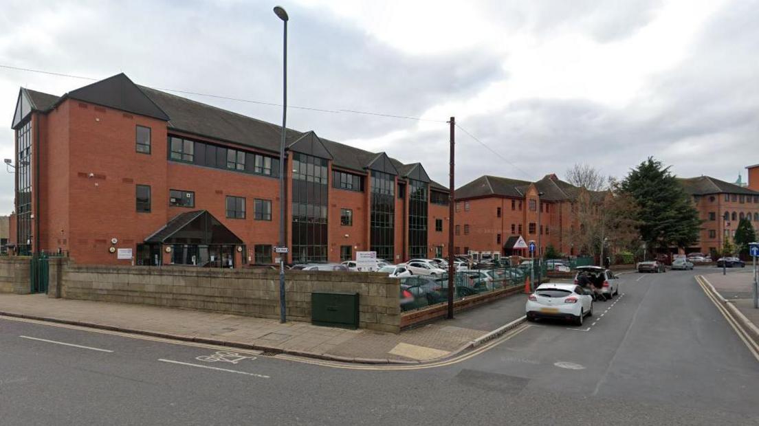 A selection of red-brick offices that will be knocked down as part of the scheme.