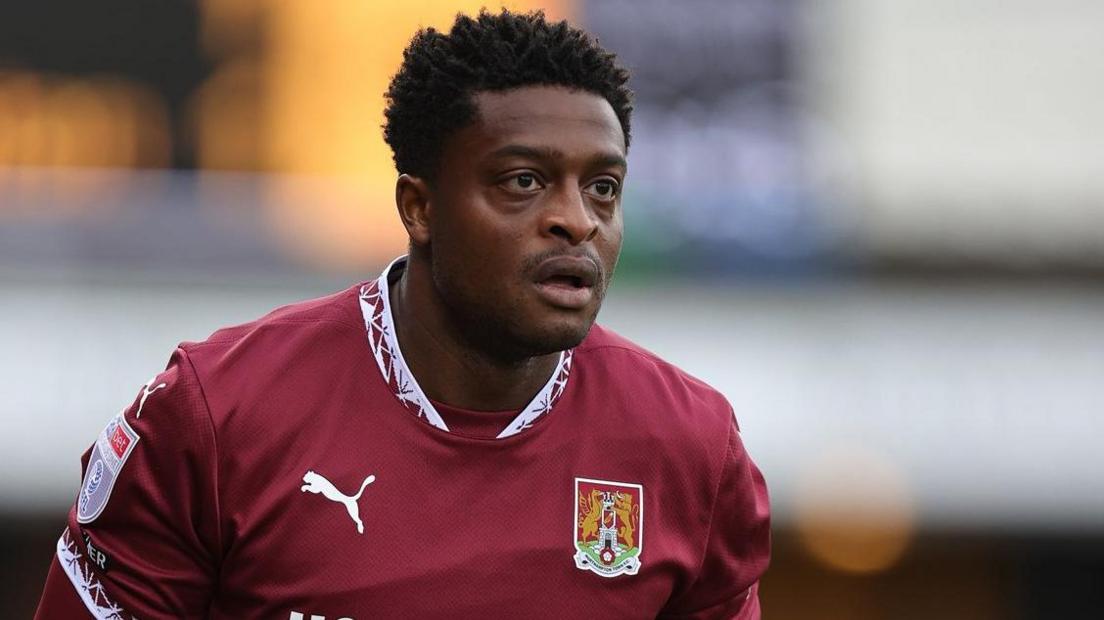 Tyler Magloire playing for Northampton Town