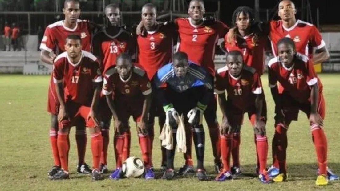 Zeph Thomas (far left, front row) pictured with St Kitts and Nevis national team - who he qualified to play for through his grandfather - in 2013