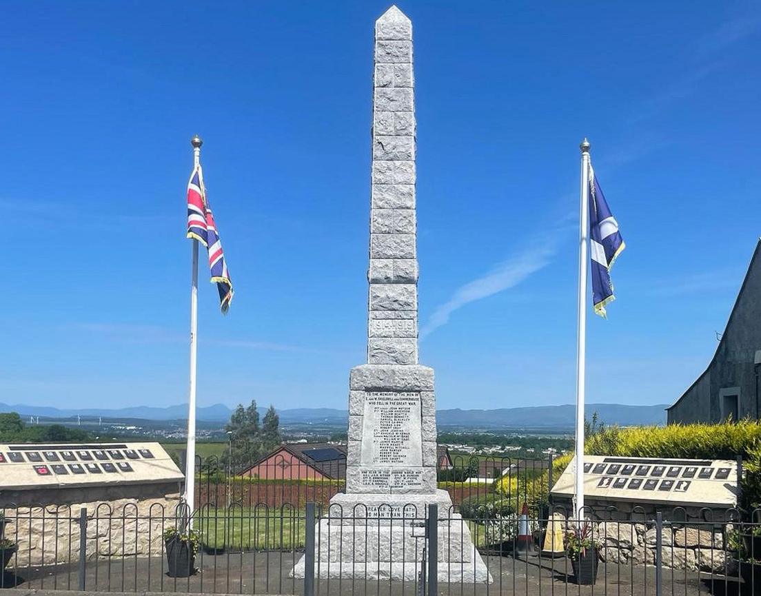 The memorial with the union flag and Scottish saltire