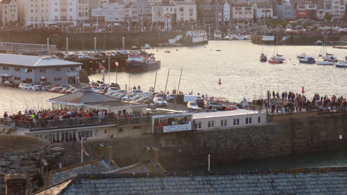 Crowds gathered at the harbour in St Peter Port, Guernsey.