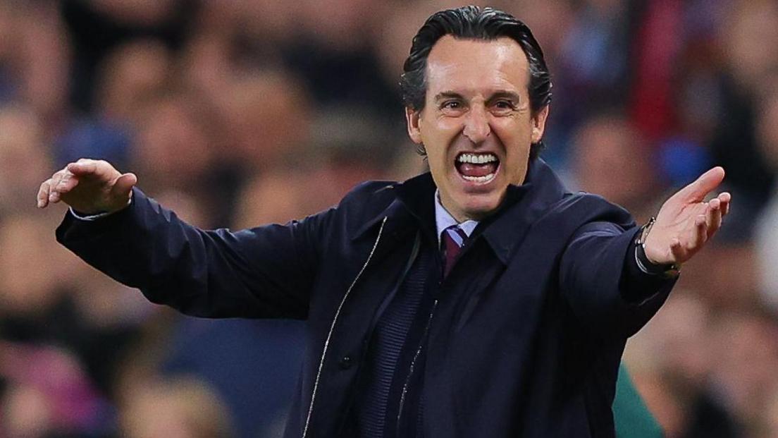 Unai Emery gesticulates on the touchline during a match