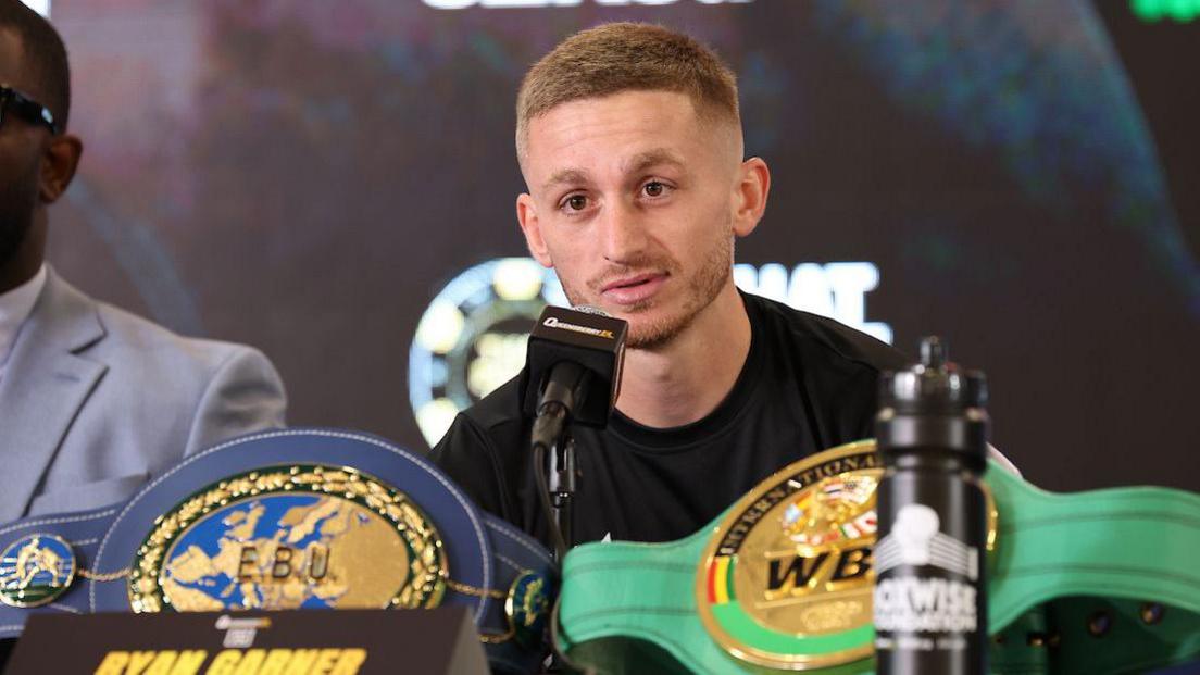 Ryan Garner looks on at a press conference for his fight