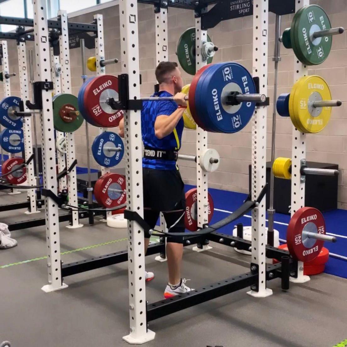 Hammy McMillan lifts weights