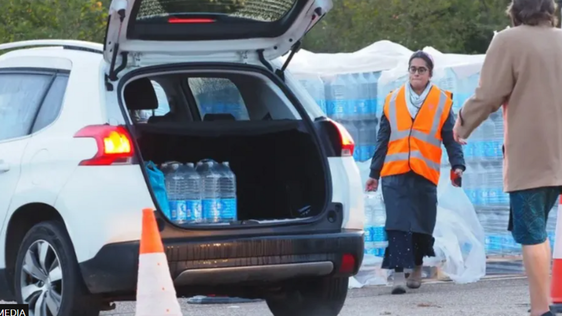 Bottled water being dispensed to customers