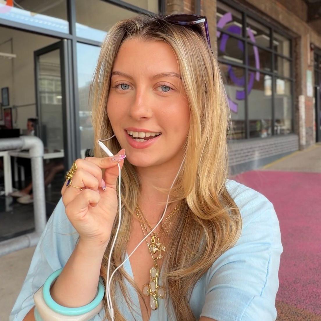 Monique Wellman-Maso utilizing wired headphones