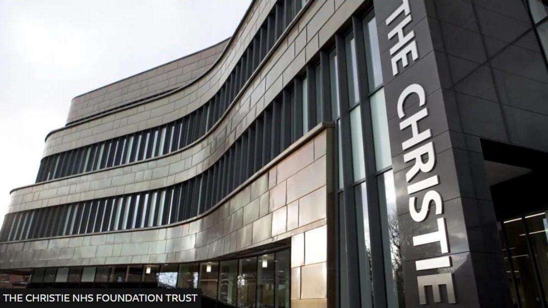 The exterior of The Christie hospital entrance with a big sign saying The Christie 