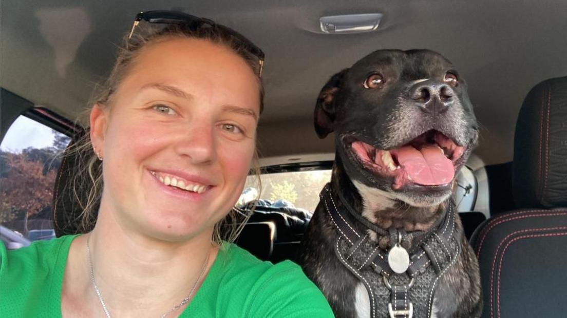 Esti Olivier and her dog Sullivan in a car