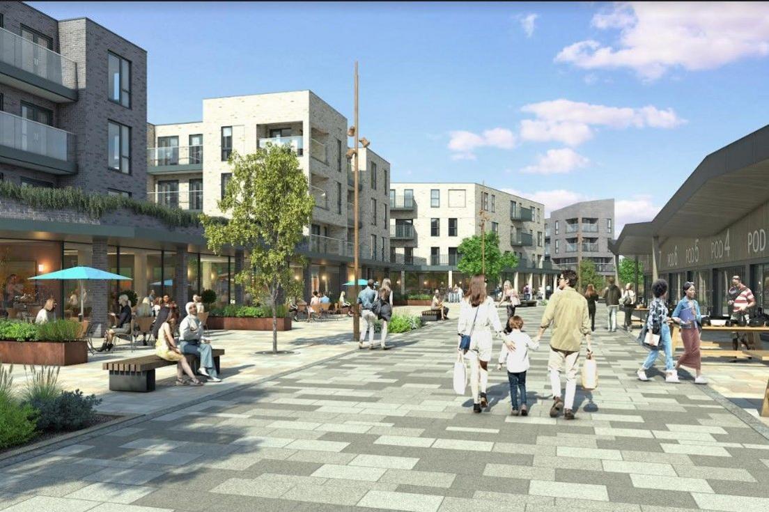 Artist's impression of people walking in a paved area with trees and public seating with shops, flats and cafes lining the sides