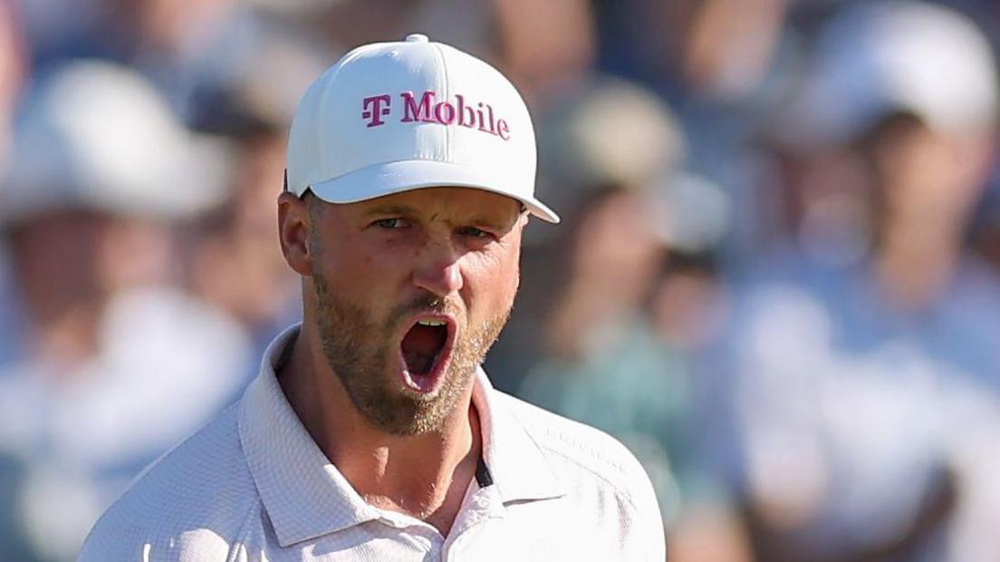 Wyndham Clark celebrates his second birdie of the round