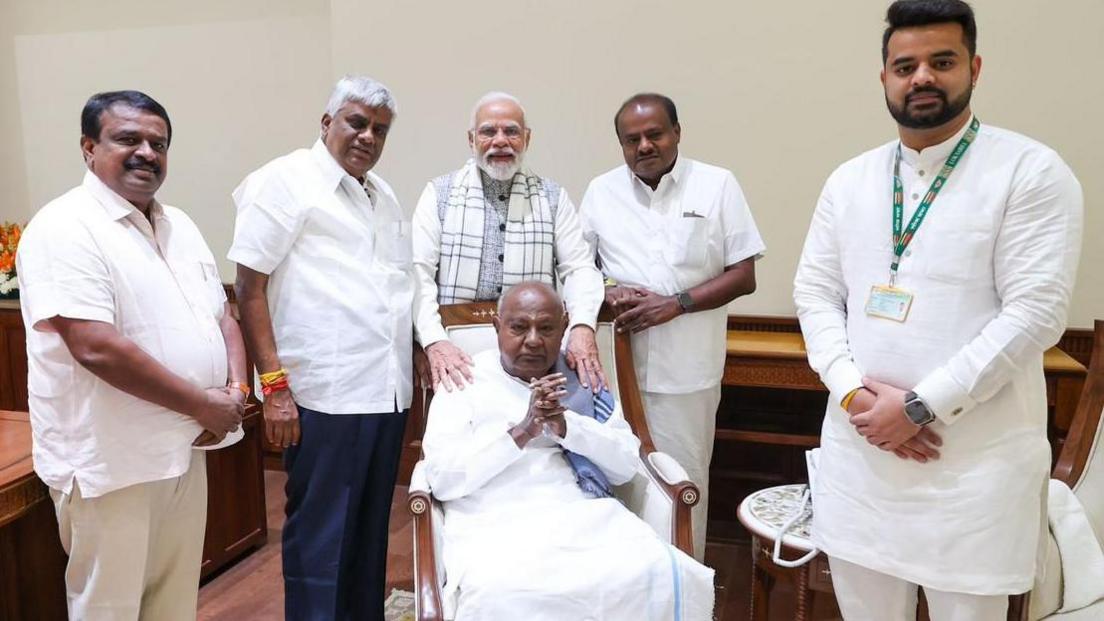 Mr Revanna (extreme right) seen meeting PM Modi (centre top) with former prime minister HD Deve Gowda (centre bottom), and party chief HD Kumaraswamy (second right)