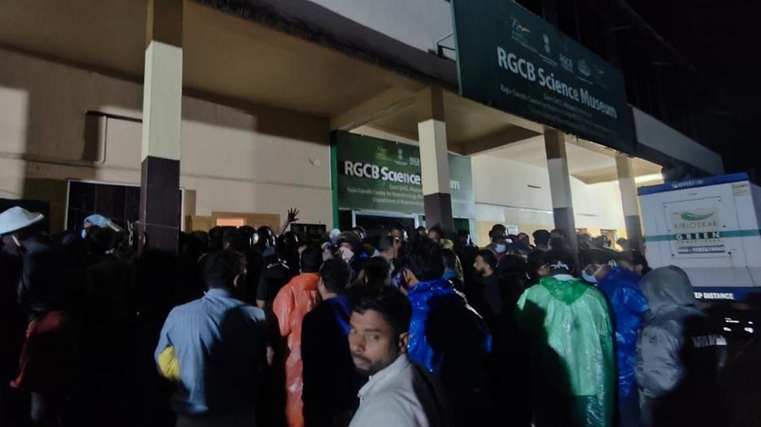 Relatives outside the local hospital where bodies are being kept