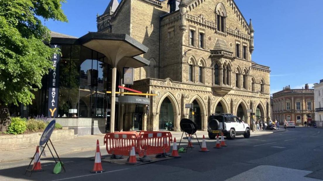 Roadworks for a sinkhole which has opened up near York Theatre Royal on St Leonard's Place in the city centre.