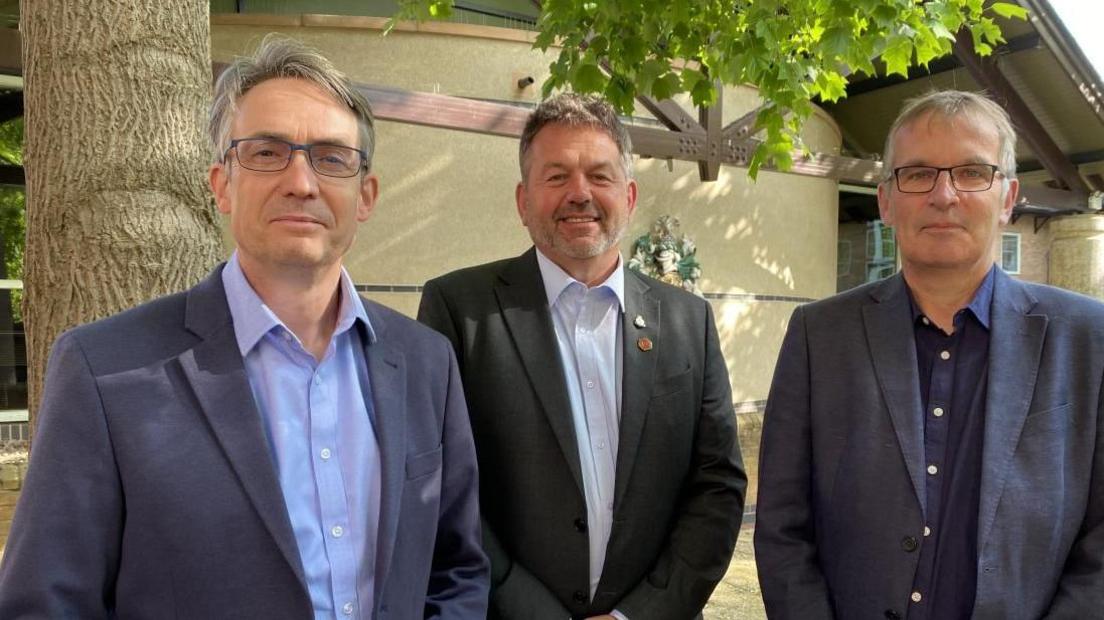 A picture of North Kesteven District Council's deputy chief executive, Phil Roberts, with council leader Richard Wright and chief executive Ian Fytche