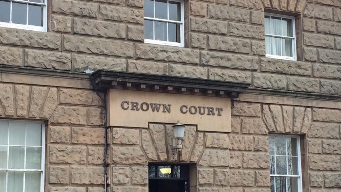 The front of the sandstone Chester Crown Court building.