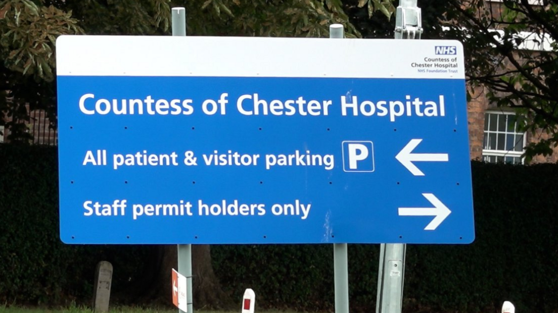 A blue and white sign outside the Countess of Chester Hospital