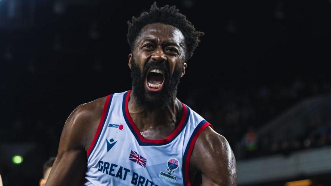 Great Britain's Gabriel Olaseni roars in celebration after scoring against Greece