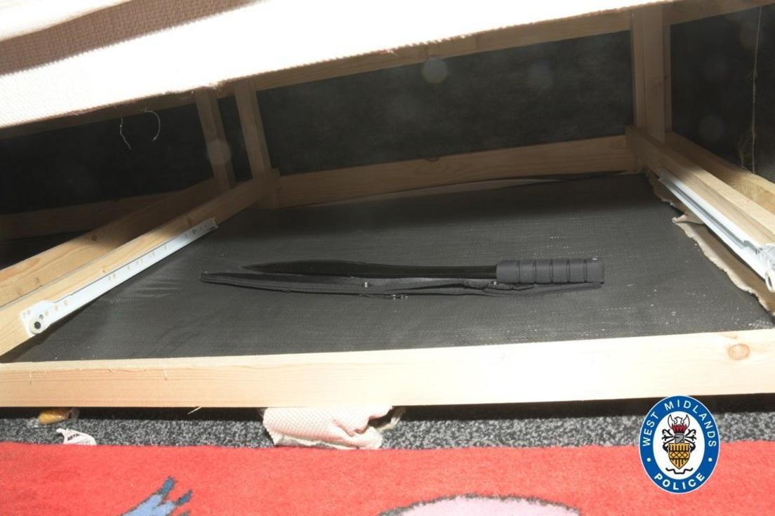 Machete under bed