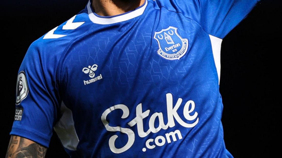 Betting company advertising on the Everton shirt.