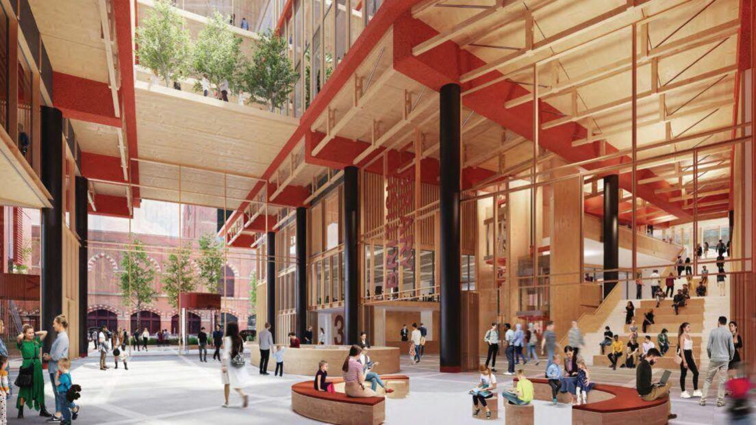 An artist's impression of another entrance to the extended space, featuring orange vertical signage for the British Library, next to exposed beams and pillars, curved benches and a large staircase going up into the distance on the right of the image