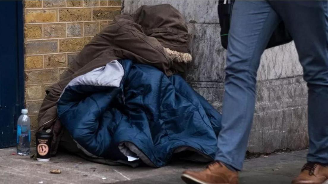 Anonymous person sleeping on the streets