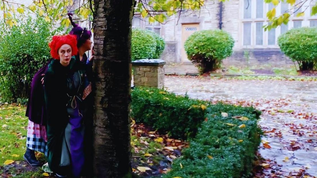 People in costume at Bolling Hall