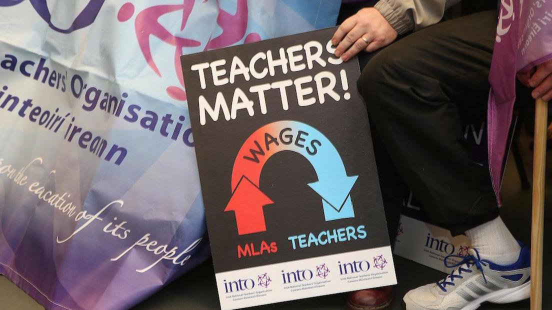 A sign which says "teachers matter"