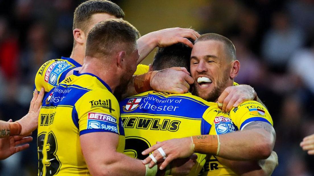 Matt Dufty celebrates scoring Warrington's opening try with Josh Thewlis