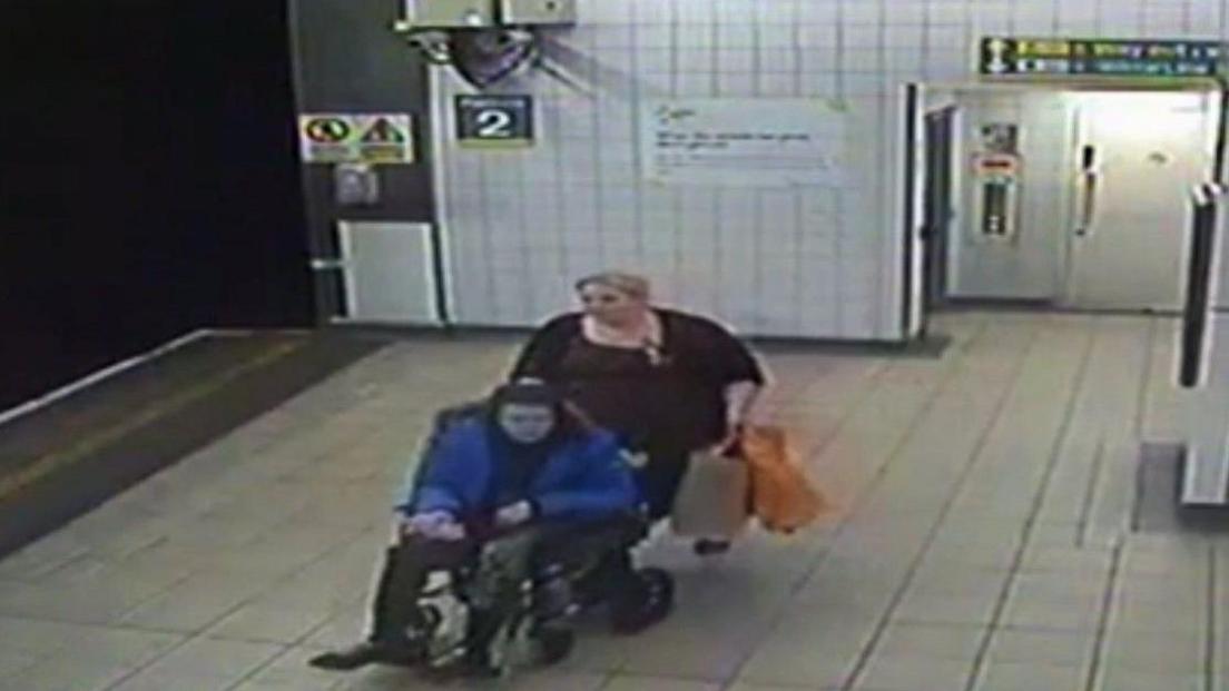 Jennifer Boyle pushes her son into Livderpool Central station