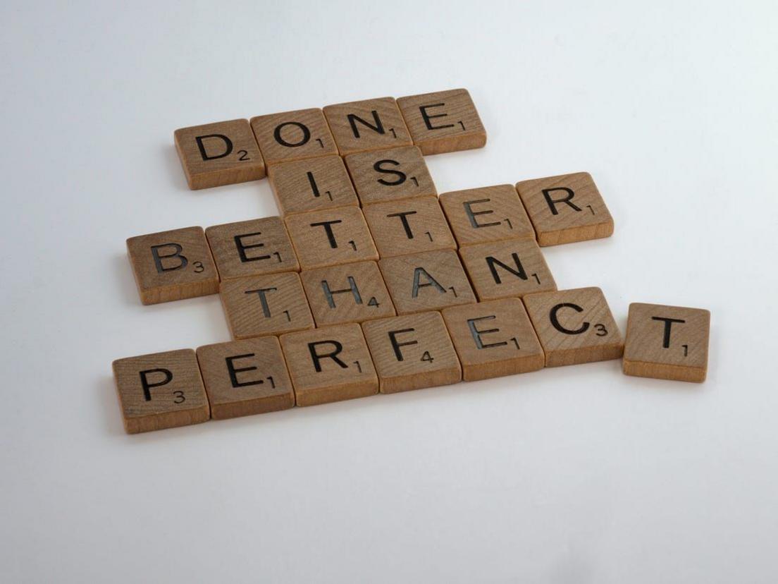 Photo of wooden letter blocks spelling: Done is better than perfect
